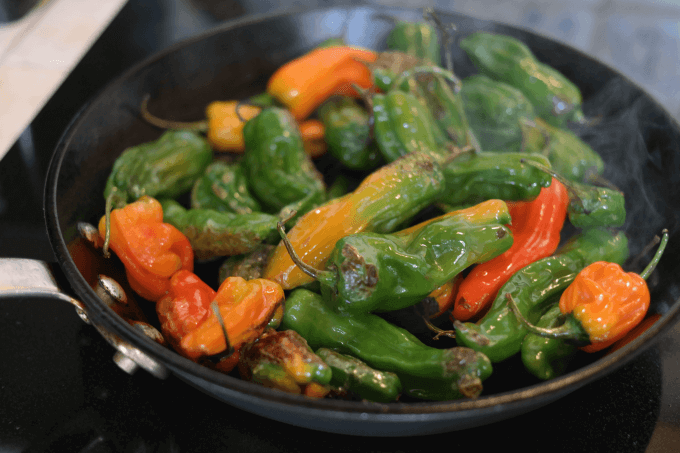 Toss the peppers occasionally until they blister on one side.  About  10 minutes.